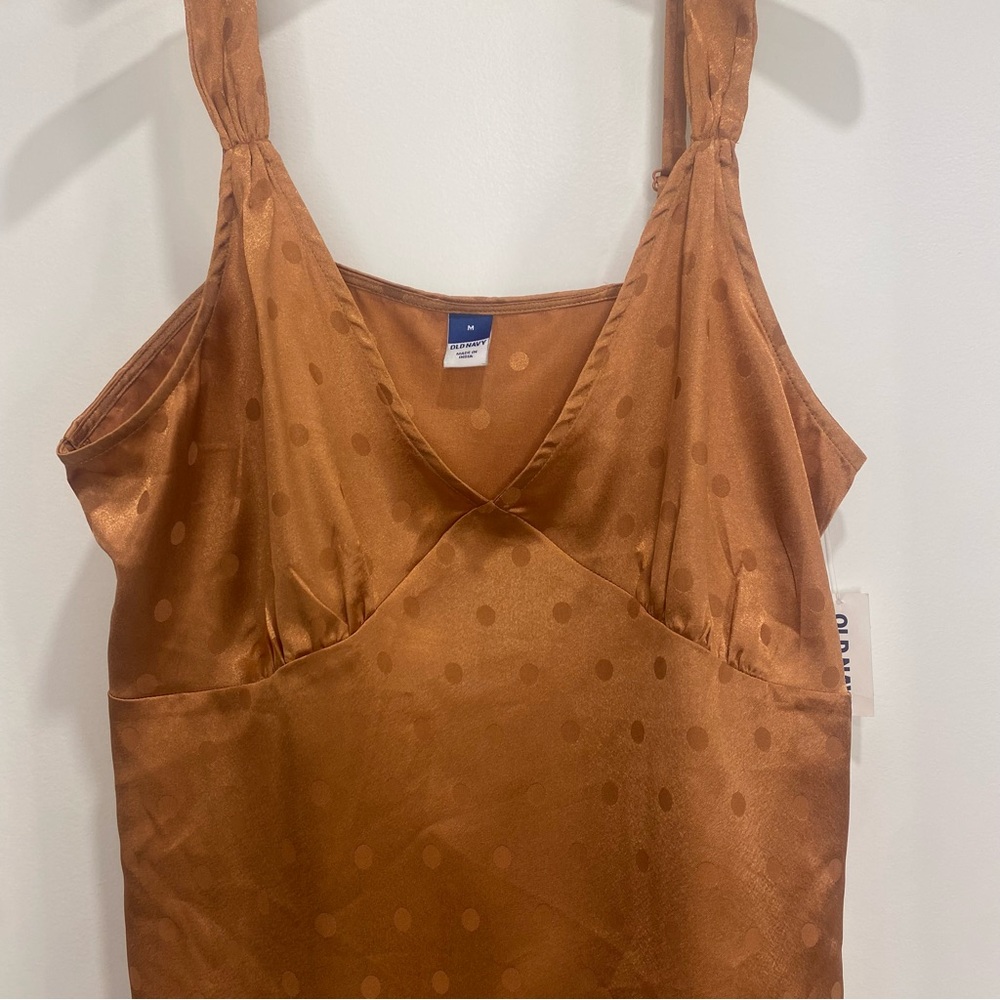 orange silky style strap top